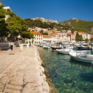 Hvar harbour, the Spanish Fortress and Hvar town centre, Hvar Island, Dalmatian Coast, Adriatic, Croatia, Europe