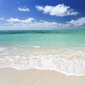 Idyllic beach scene with blue sky, aquamarine sea and soft sand, Ile Aux Cerfs, Mauritius, Indian Ocean, Africa