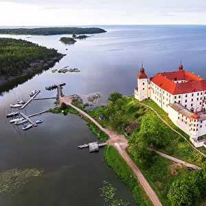 Lacko Castle at sunset, aerial view, Kallandso island, Vanern lake, Vastra Gotaland, Sweden, Scandinavia, Europe