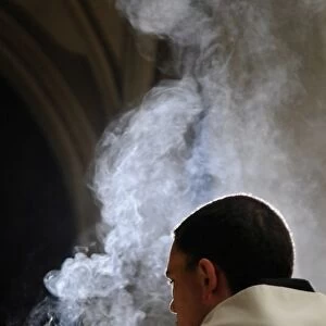Monk holding an incense bowl during an Ecumenical celebration, Paris, France, Europe