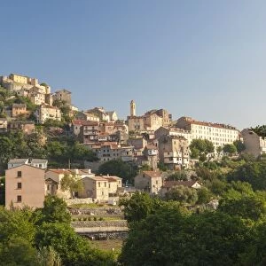 The old citadel of Corte perched on the hill surrounded by mountains, Haute-Corse
