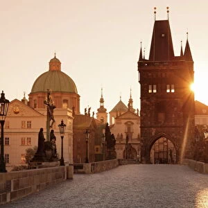 Old Town Bridge Tower and Charles Bridge at sunrise, UNESCO World Heritage Site, Prague, Bohemia, Czech Republic, Europe