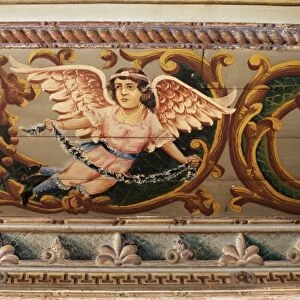 Detail of the painted ceiling done in the European
