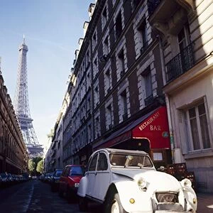 Parked Citroen on Rue de Monttessuy, with the Eiffel Tower behind, Paris