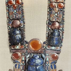 Pendant in the form of a boat showing a scarab, the symbol of the gods resurrection