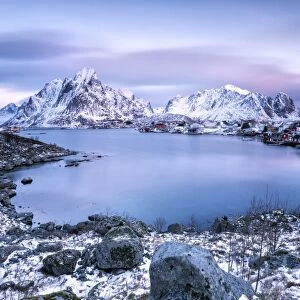 Pinksky dominates the scenery in Reine at dusk, Lofoten Islands, Arctic, Norway, Scandinavia