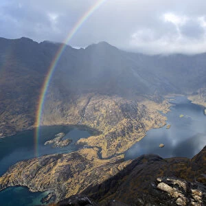 A rainbow above Loch Coruisk and the main Cuillin ridge seen from the top of Sgurr