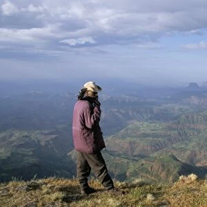 Ranger and mountain scenery, Simien Mountains National Park, UNESCO World Heritage Site