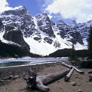 Reduced water level in Moraine Lake following a dry year, and Wenkchemna Mountains