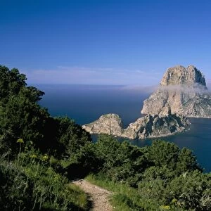 The rocky islet of Es Vedra surrounded by mist