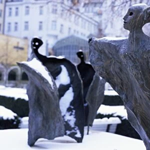 Snow covered statues in Frantiskanska Garden, Nove Mesto, Prague, Czech Republic, Europe