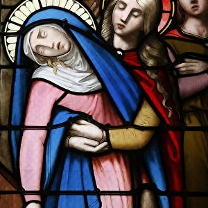 Stained glass window of the Virgin Mary at Collegiale Notre-Dame des Marais