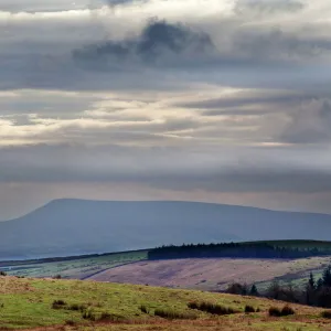 Stormy sky over Pendle Hill from above Settle, North Yorkshire, Yorkshire, England, United Kingdom, Europe