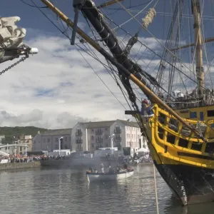 Tall ship Grand Turk, moored in inner harbour, with long boat in attendance, Whitehaven