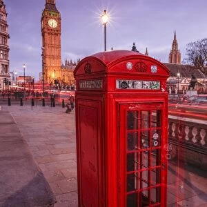 Typical English red telephone box near Big Ben, Westminster, London, England, United Kingdom