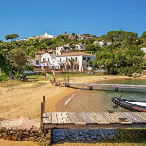 View of beach and whitewashed villas of Porto Rafael, Sardinia, Italy, Mediterranean, Europe