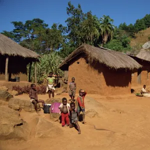 Village scene, children in foreground, Zomba Plateau, Malawi, Africa