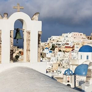 The white of the church and houses and the blue of Aegean Sea as symbols of Greece