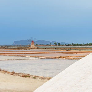Windmill with pile of salt in the salt flats, Saline Ettore e Infersa, Marsala, province of Trapani, Sicily, Italy, Mediterranean, Europe