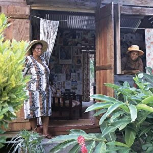 Two women, typical Creole house