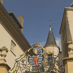 Wrought iron gate with coat of arms