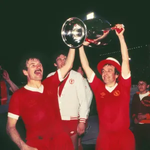 Liverpools Phil Neal and Ian Callaghan celebrate victory in the 1977 European Cup Final