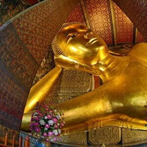 Golden Reclining Buddha statue at the Wat Pho Temple Bangkok, Thailand