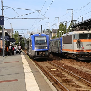 The 17. 30 from Dol de Bretagne to Dinan and a down Rennes train waiting at Dol de
