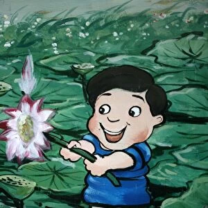 Taiwanese boy in lily pond