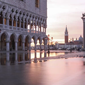 Acqua Alta in St Marks square at sunrise, Venice; Veneto; Italy