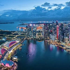Aerial view of Marina Bay Sands and Singapore City Harbour at night, Singapore, Asia