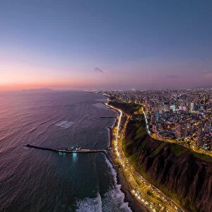 Aerial view over Miraflores at dusk, Lima, Peru, South America