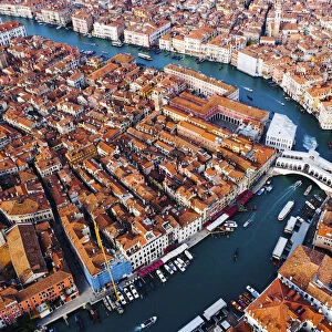 Aerial view of Rialto bridge at sunrise, Venice, Italy