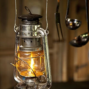 Bedfordshire, England. A paraffin lamp in a glamping holiday tent