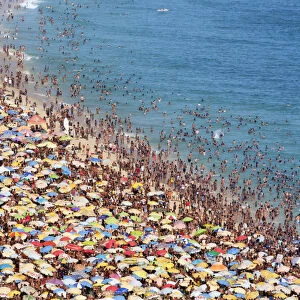 Brazil, Rio de Janeiro, crowds on Ipanema beach during carnival time