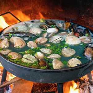 Chilean dish named mariscos al disco on open fire, Valparaiso, Valparaiso Province, Valparaiso Region, Chile