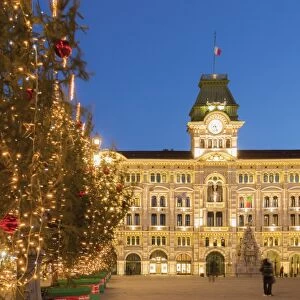 The city hall in Unita d Italia square in Trieste in Christmas time at dusk. Trieste city