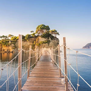 Hanging wooden bridge over the sea leading to Cameo Island, Agios Sostis, Zakynthos