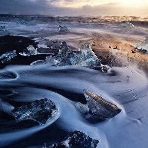 the ice blocks of the famous Black Sand Beach, Jokusarloon, Iceland