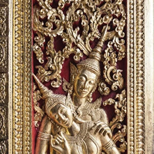 Laos, Luang Prabang, Wat Xieng Thong, door detail