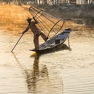 Leg-rowing fisherman of Inle Lake in the morning mist, Shan State, Myanmar