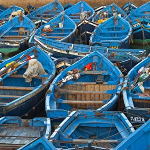 Port, Essaouira, Morocco. Typical blue portoguese boats moored at the port