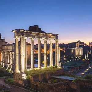 Rome, Lazio, Italy. Panoramic view of the Imperial Forum at dusk