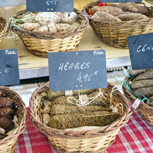 Saucission sec, dry cured sausage for sale at weekly farmers market in bastide