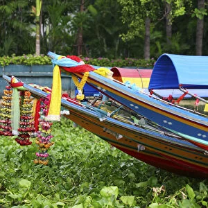 South East Asia, Thailand, Bangkok, flower garlands on the heads of long tailed boats