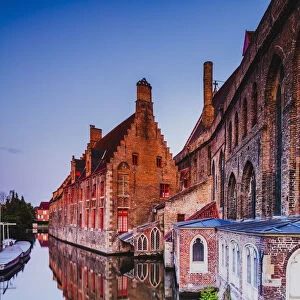 St. John hospital (Sint-Janshospitaal, now a museum) reflecting in the water canal