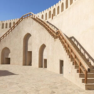 Stairs leading up to the circular wall in the restored Bahla Fort, Tanuf, Oman