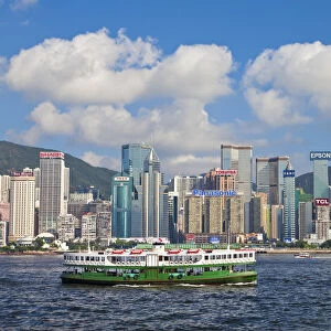 Star Ferry crossing Victoria Harbour towards Hong Kong Island, with Central skyline