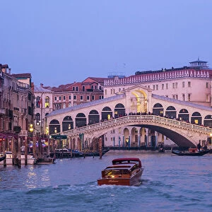 Taxi boat & Rialto Bridge, Grand Canal, Venice, Veneto, Italy