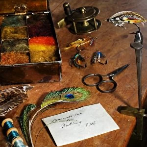 UK. Antique fly-tying equipment with a traditionally